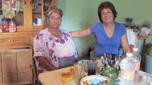 Pictured is Lynn Stephen with an elderly woman in Oaxaca, Mexico.